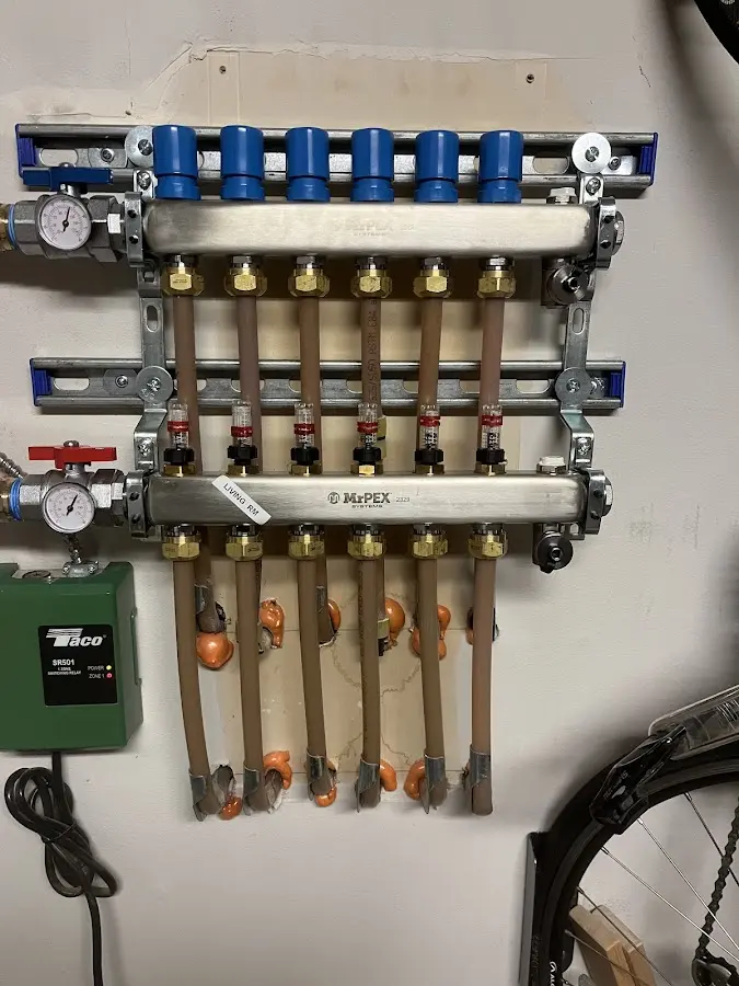 Plumber performing Water Heater Repair at a residential property in Hillsboro